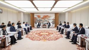 莫鼎革与北京市东城区委书记孙新军举行会谈