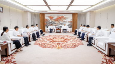 莫鼎革与沈阳化工大学党委书记周志强举行会谈